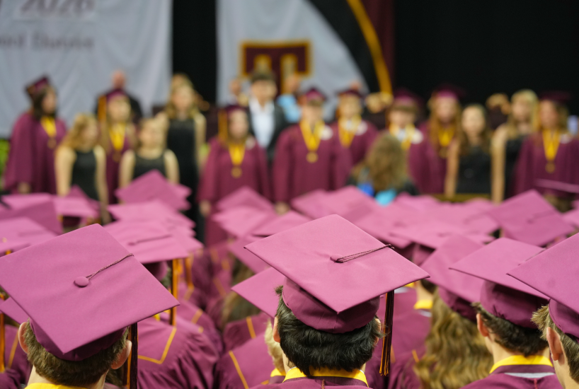 graduates watch the choir perform at the Class of 2026 graduation ceremony